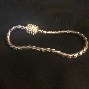 Silver plated, charm bracelet. 7 inches, decorative magnetic clasp